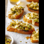 Brussels Sprouts Crostini with White Cheddar and Hot Honey